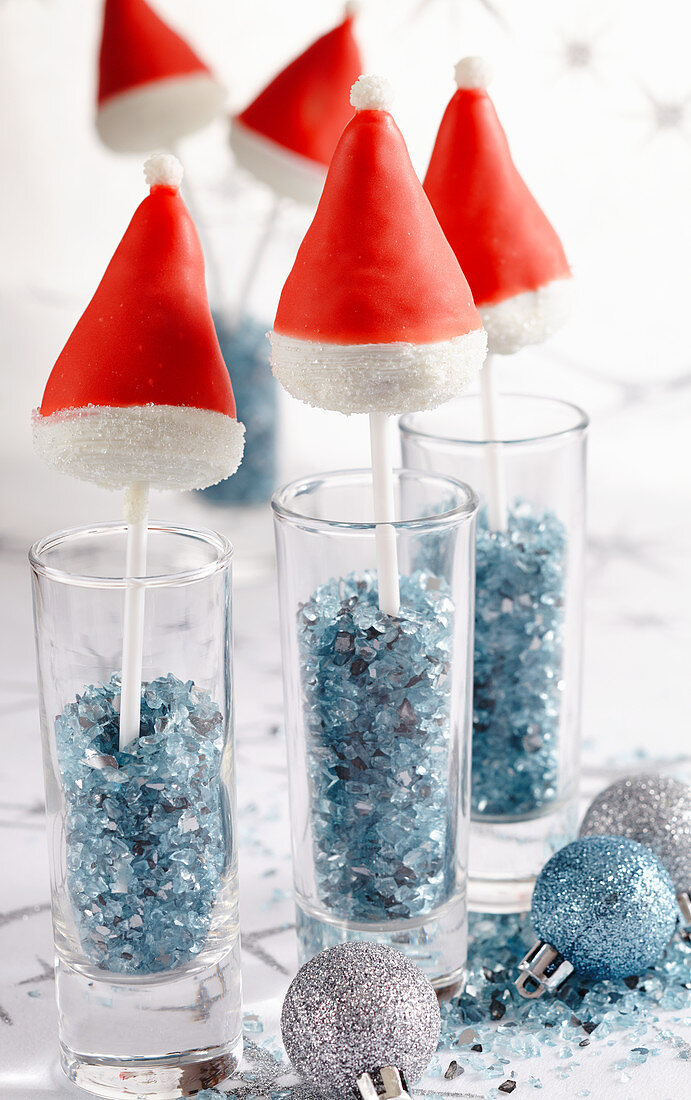 Father Christmas cake pops in glasses