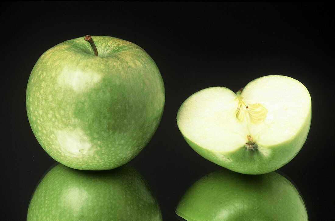 Whole and Half of a Granny Smith Apple