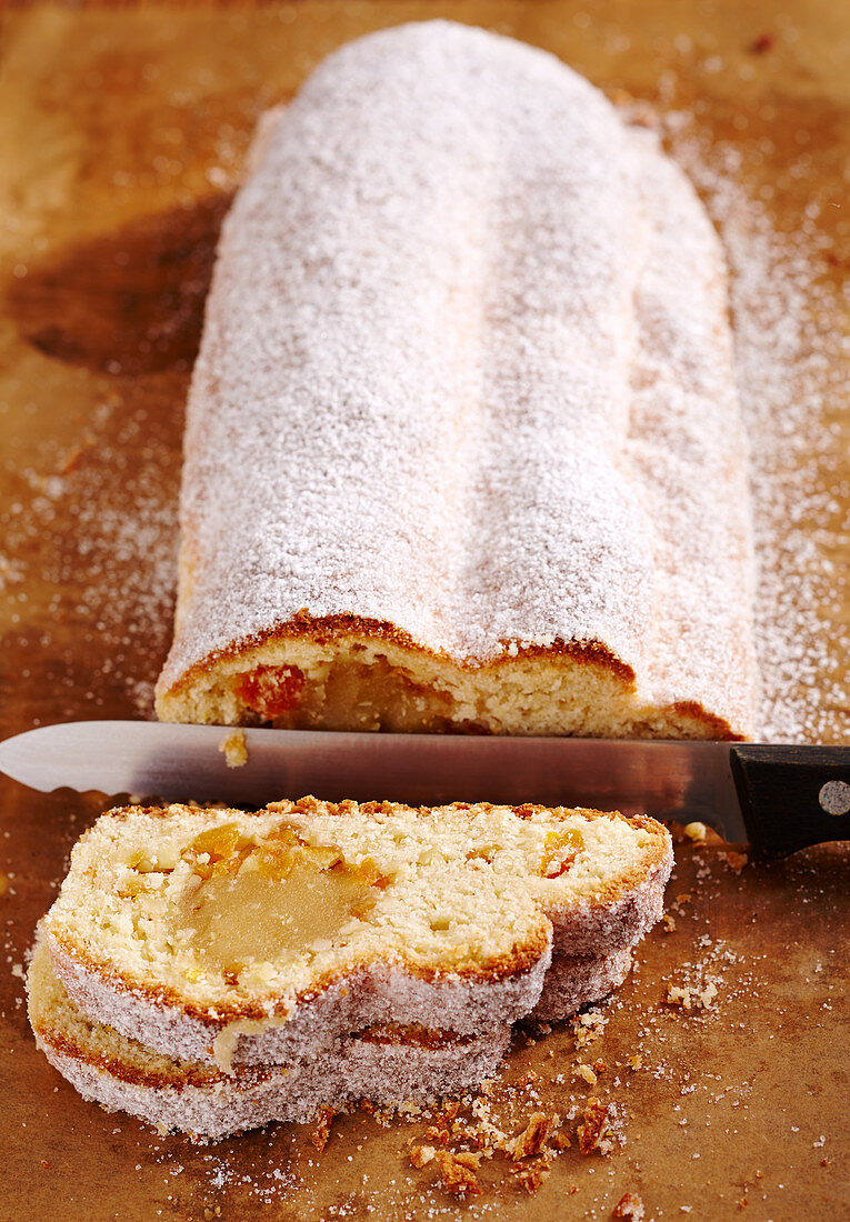 Orange and almond stollen filled with marzipan, orange peel and orange liqueur