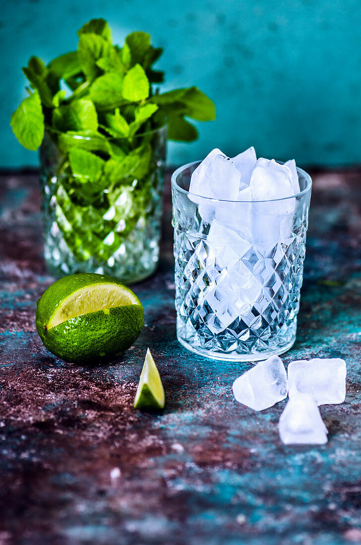 Lime, mint and ice in a crystal glass for mojito