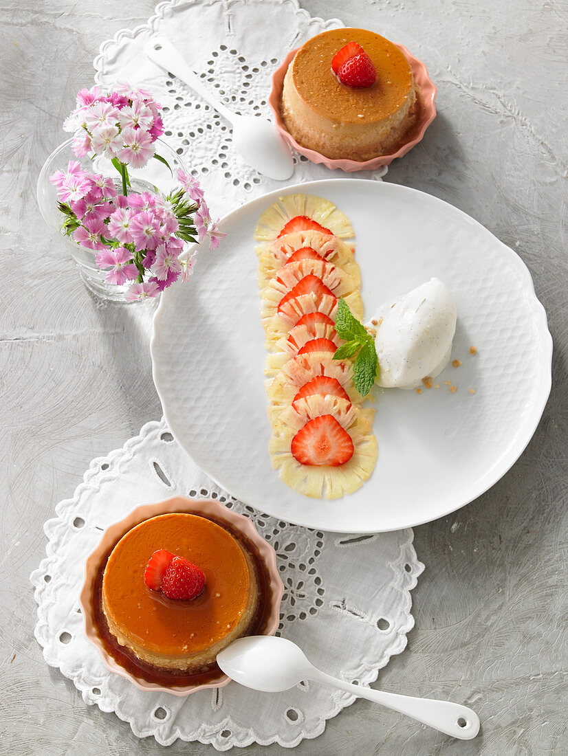 Strawberry flans with strawberry and pineapple carpaccio