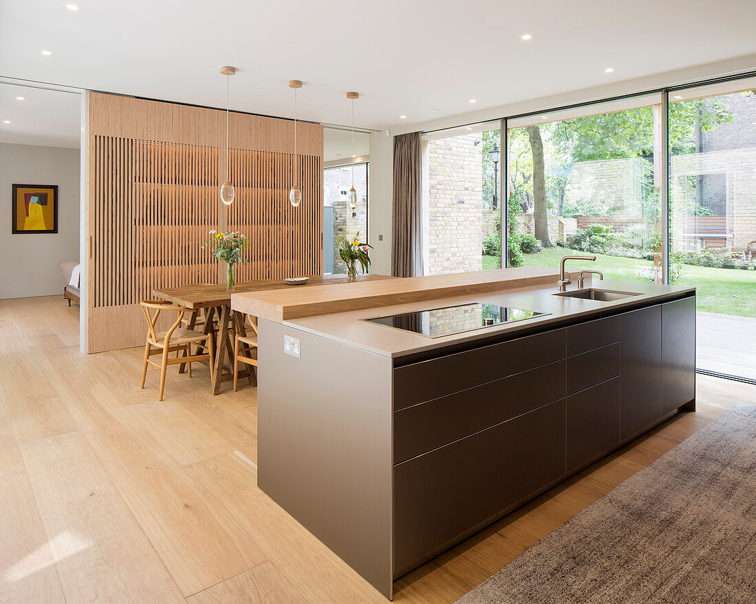 Kitchen and dining area with view of garden