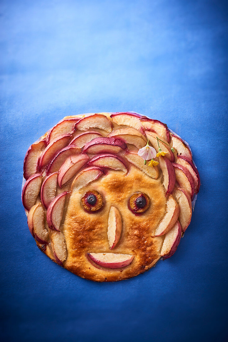 A fruit tart with a face