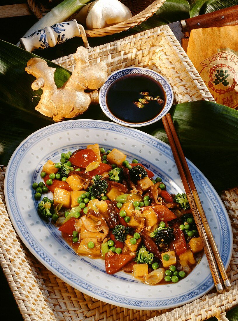 Sweet & sour vegetables & shiitake mushrooms on Chinese plate