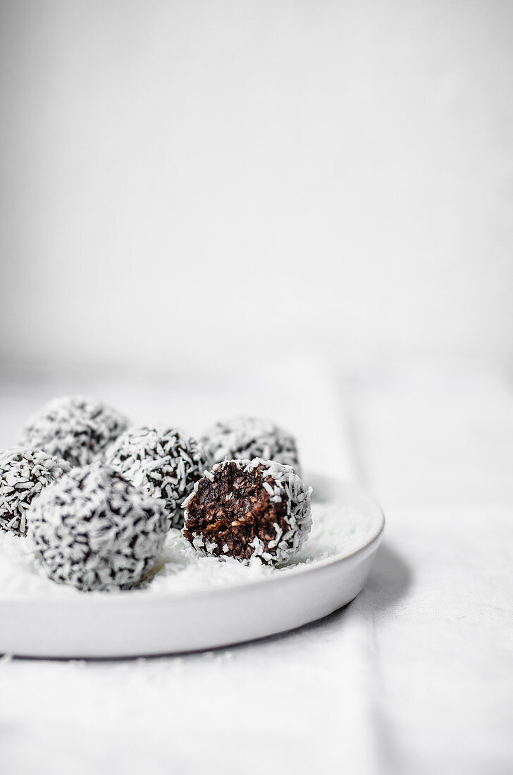 Chocolate coconut energy balls rolled in coconut