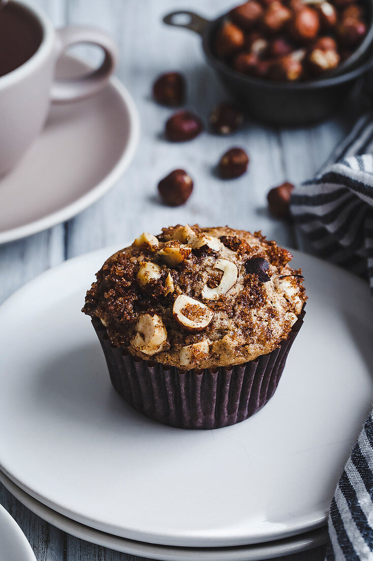 Hazelnut muffins on white background