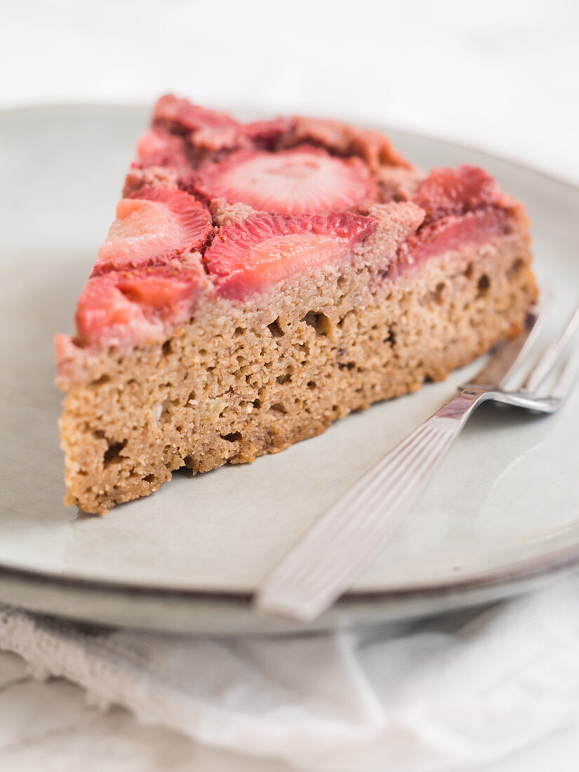 Slice of a strawberry upside-down cake, gluten and sugar free
