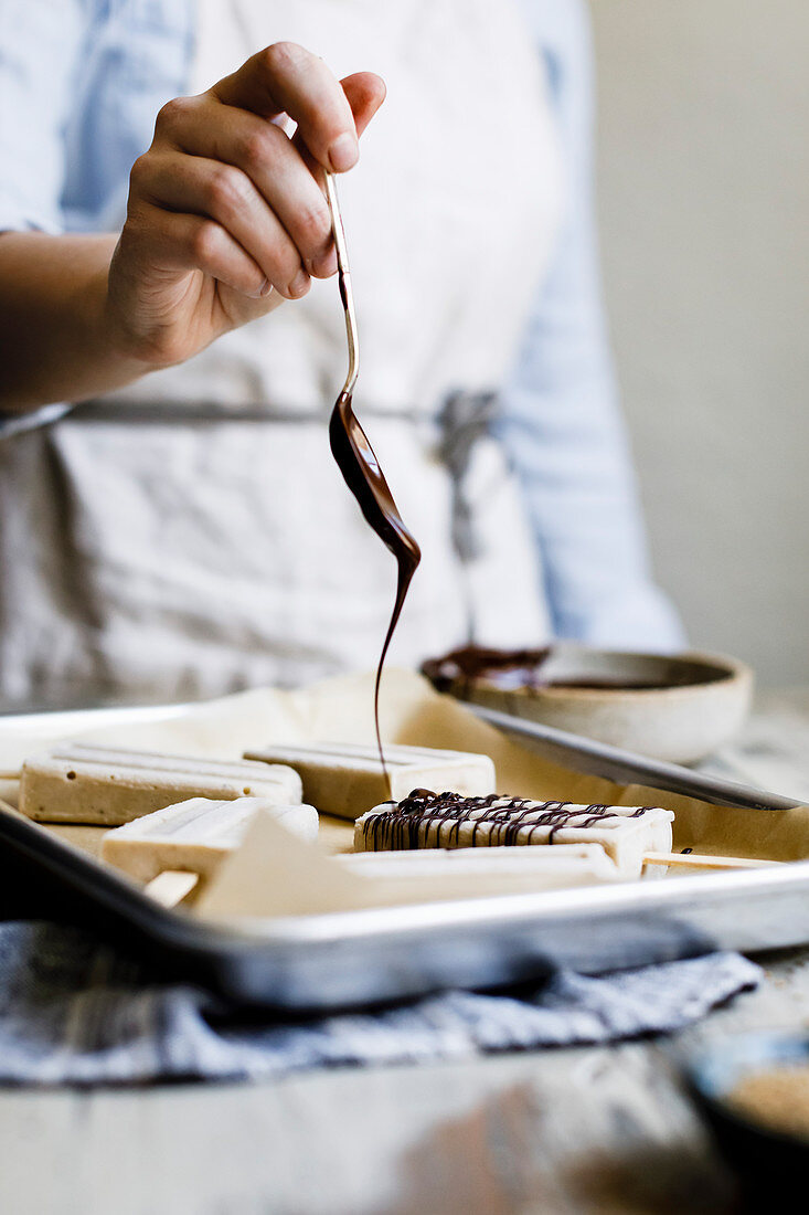 Banana tahini ice cream drizzled with chocolate