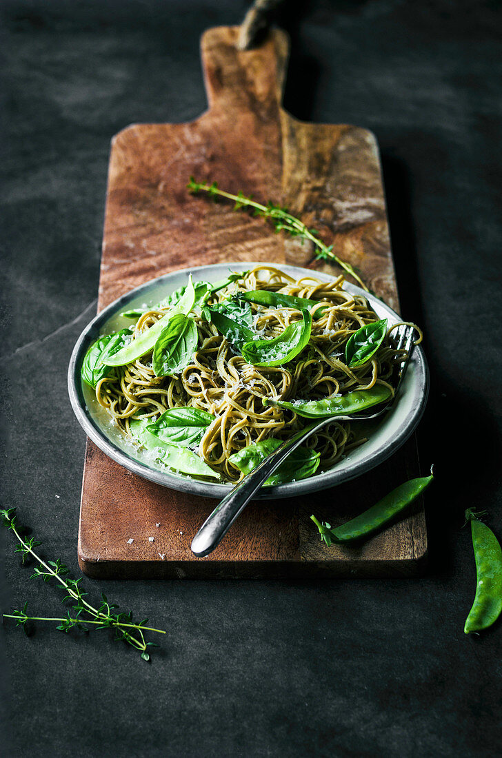 Gluten free spaghetti with snap peas, basil, and thyme.