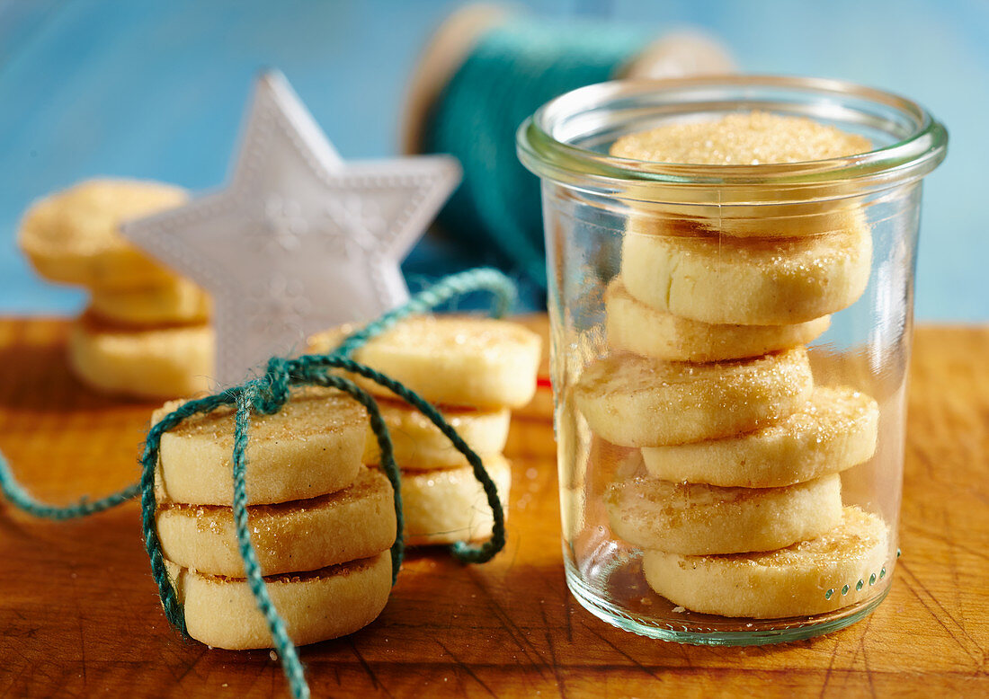 Scottish butter cookies with brown sugar in a glass jar for Christmas