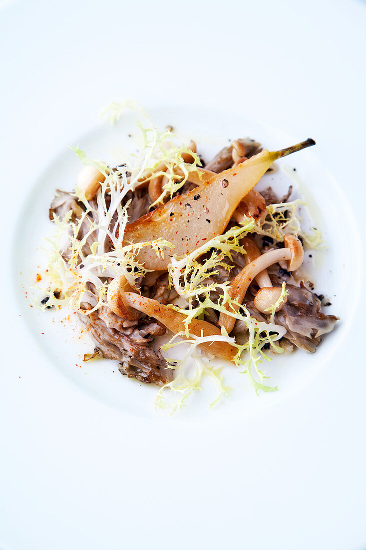 Cauliflower fungus with pears and frisée lettuce