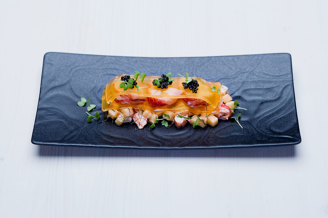 Blue lobster mille feuille with sugar melon, mint and salmon caviar