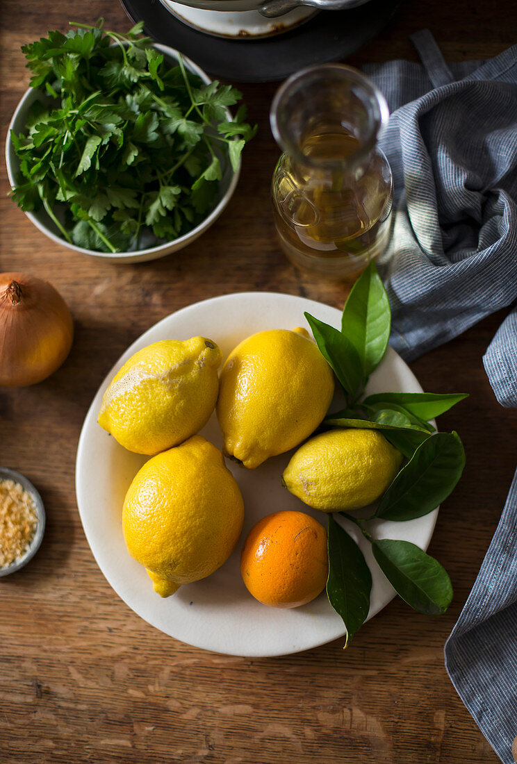 Lemon, orange, and fresh herbs