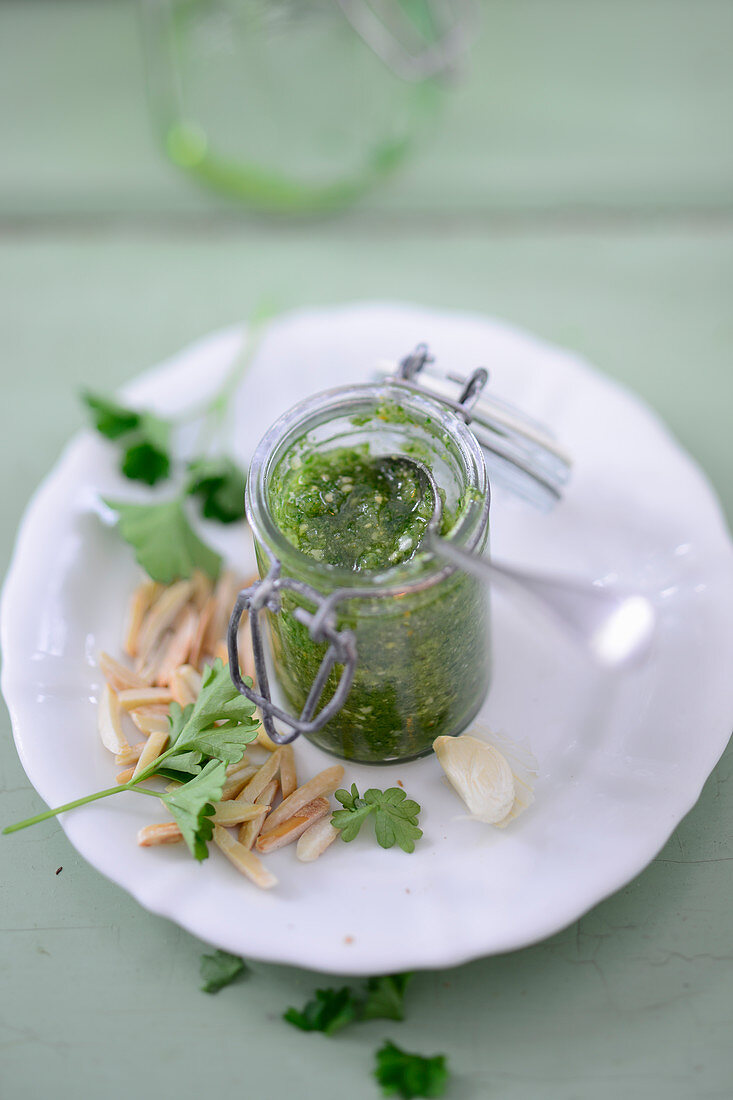 A jar of parsley pesto