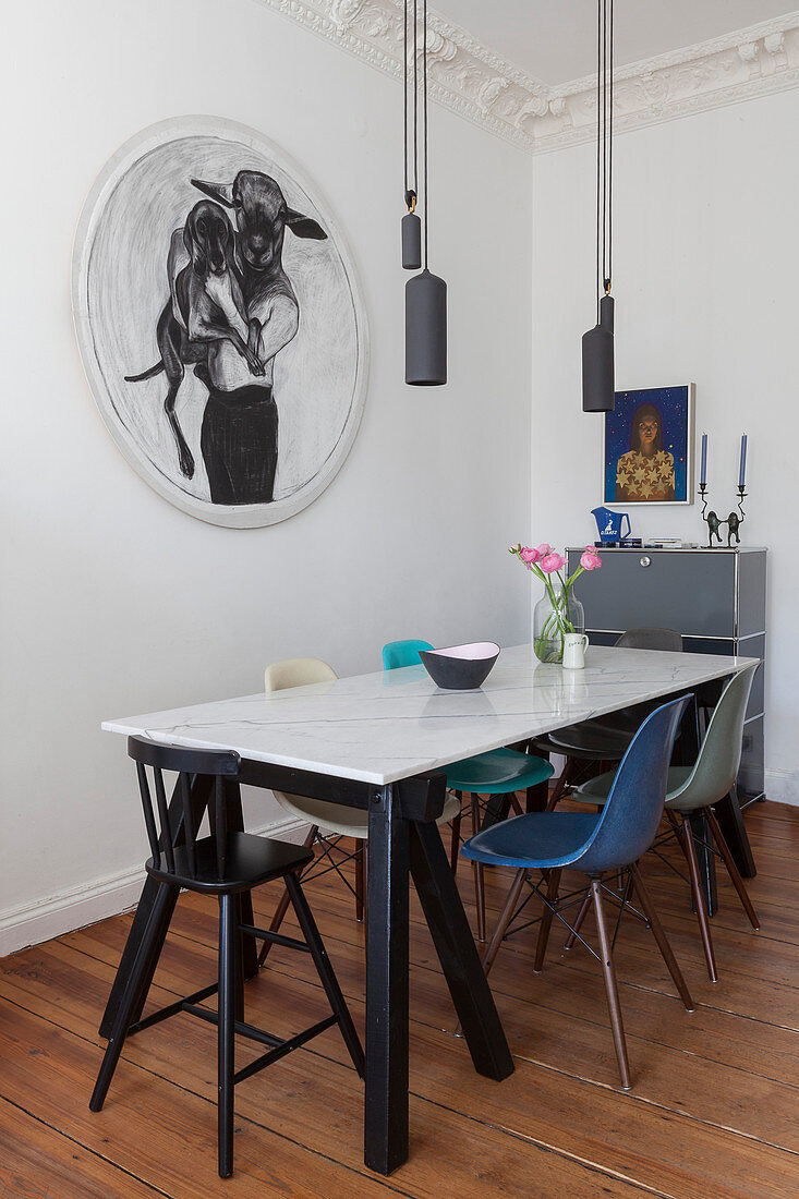 Dining table with marble top in sophisticated living room