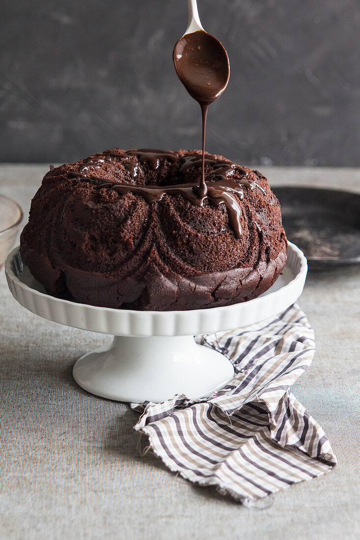 Homemade chocolate bundt cake with chocolate syrup