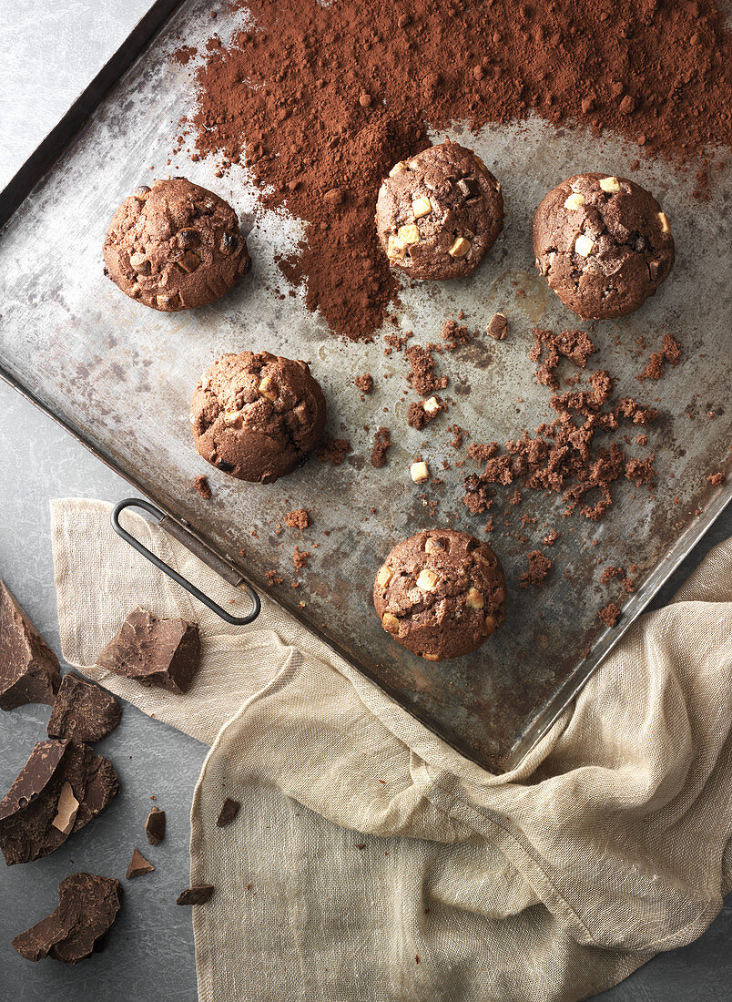 Chocolate chip muffins on a baking tray