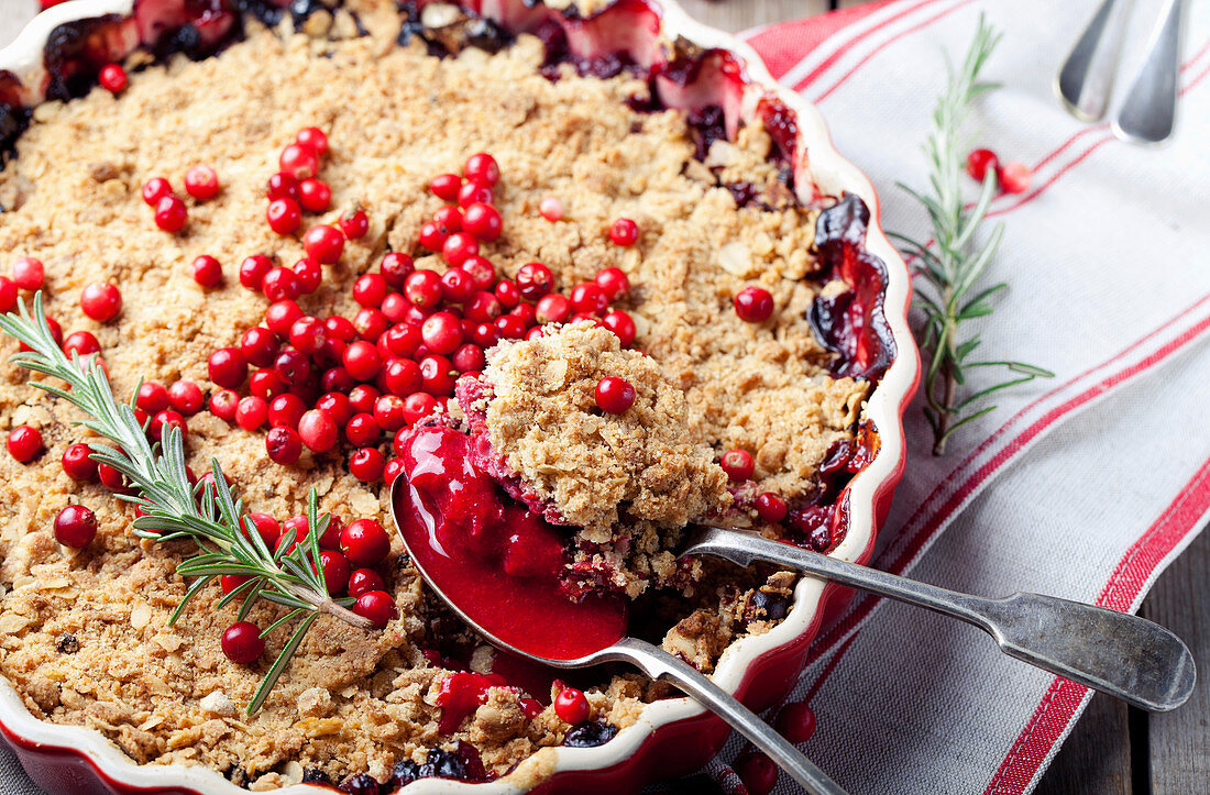 Cranberry, bilberry crumble with rosemary