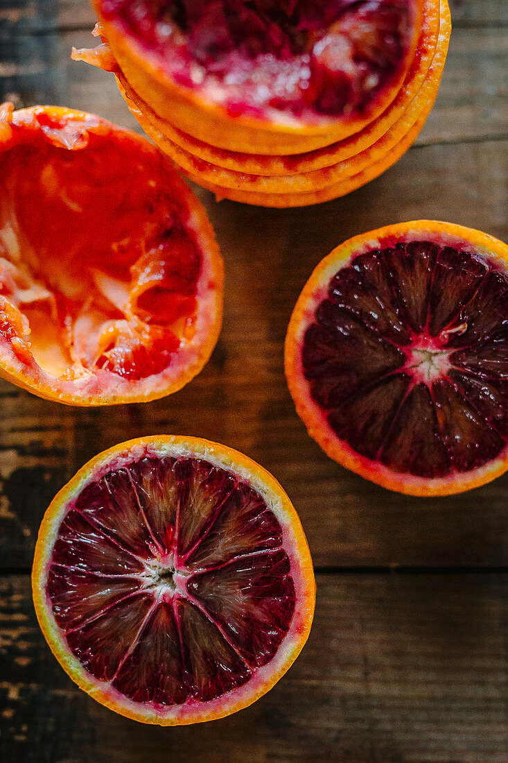 Blood oranges, halved and squeezed