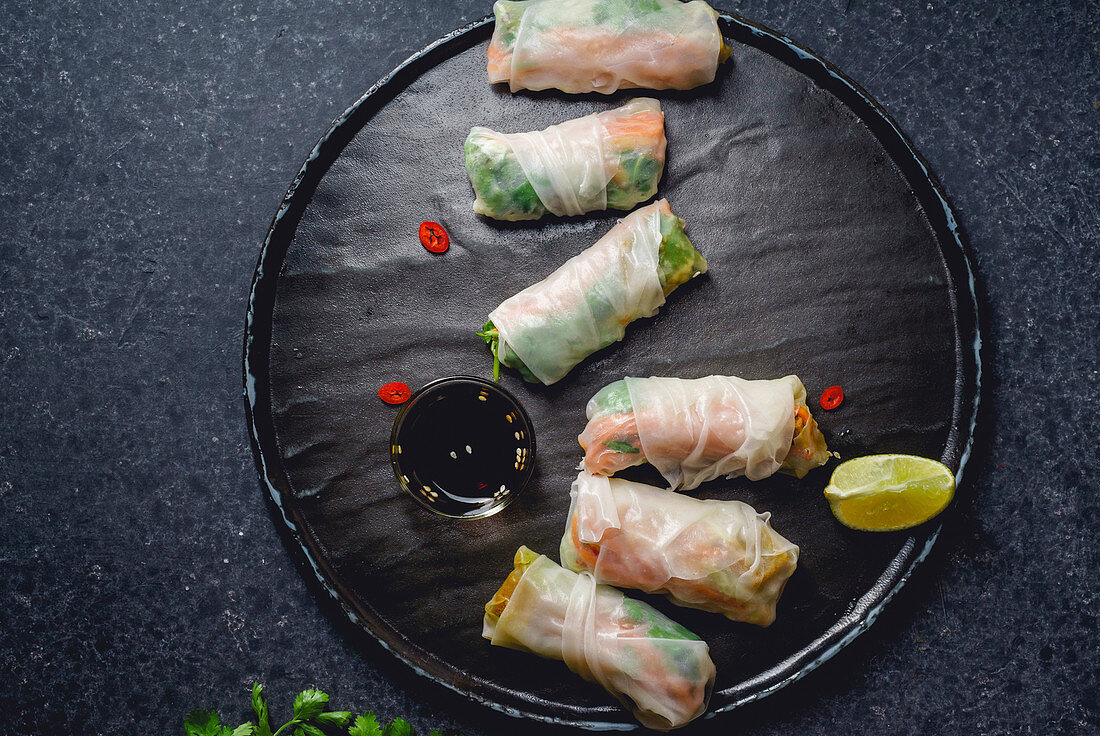 Vegan spring rolls with tofu, marinated carrot and daikon