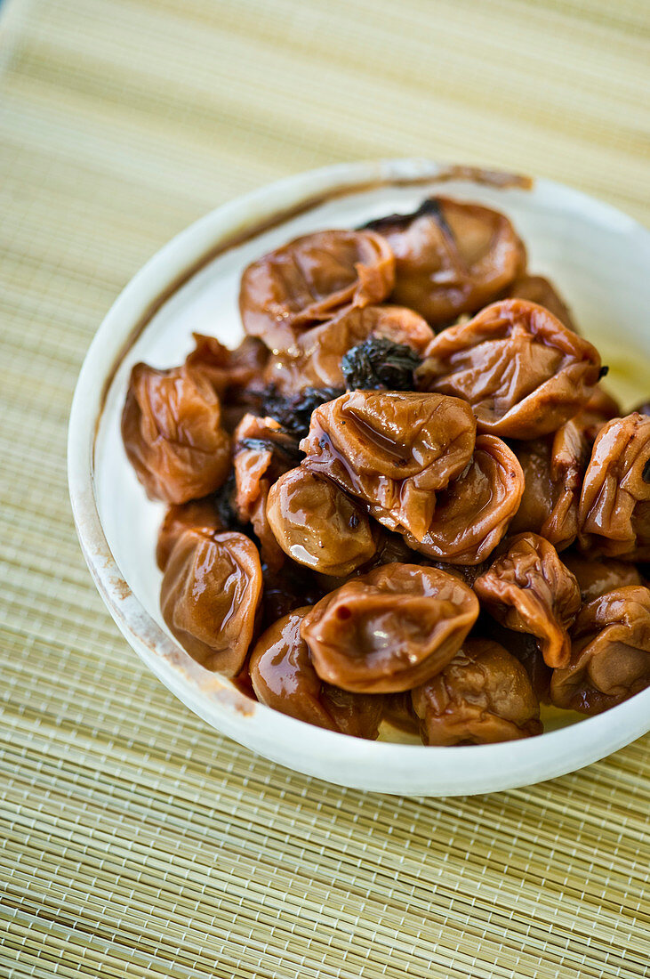 Umeboshi plums in a small bowl