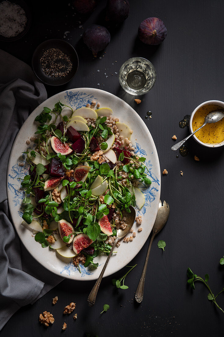 Autumnal salad with pearl barley, watercress, roasted beetroots, apple, walnuts and figs with cider vinaigrette