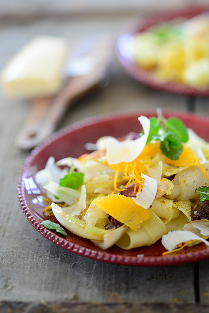 Pappardelle with radicchio and oranges in a curry sauce