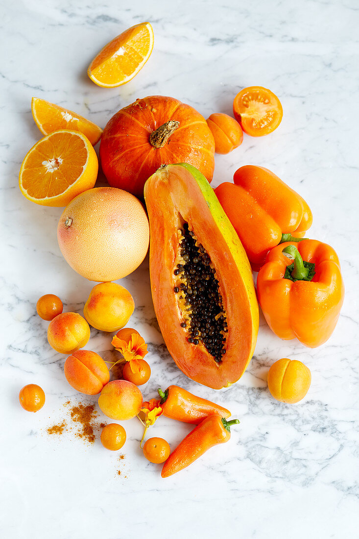 An arrangement of orange foods (seen from above)