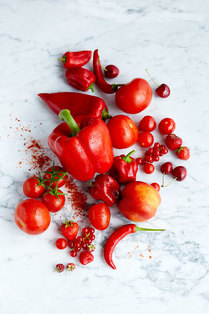 An arrangement of red foods (seen from above)