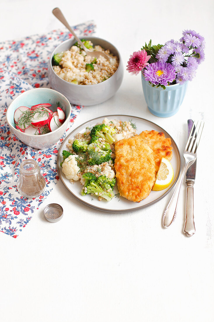 Turkey schnitzel with barley and vegetables