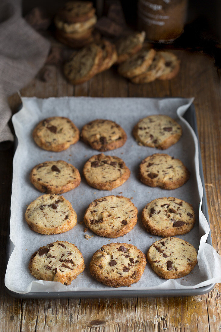 Homemade chocolate chip shortbread on a baking tray