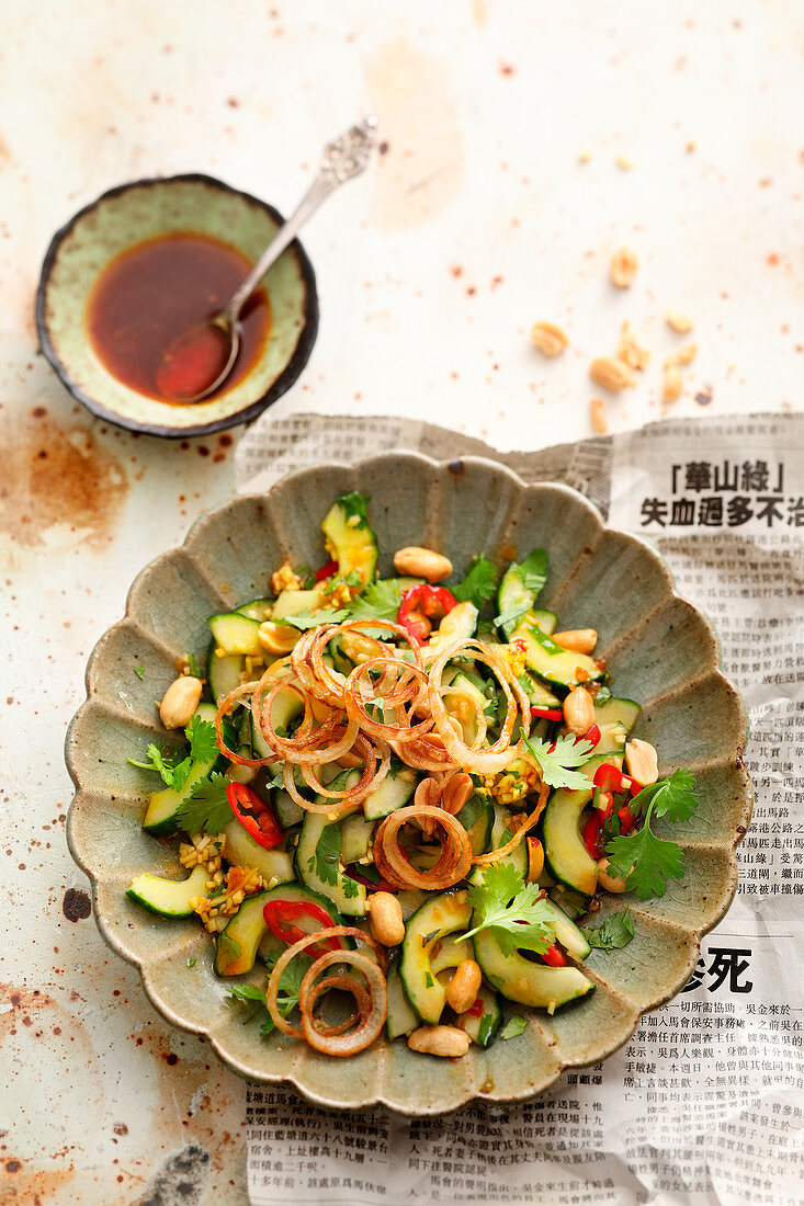 Asian cucumber salad with chili, nuts and cilantro