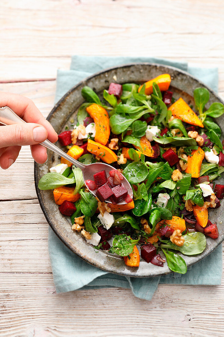 Beetroot and lambs lettuce salad with pumpkin and goat's cheese