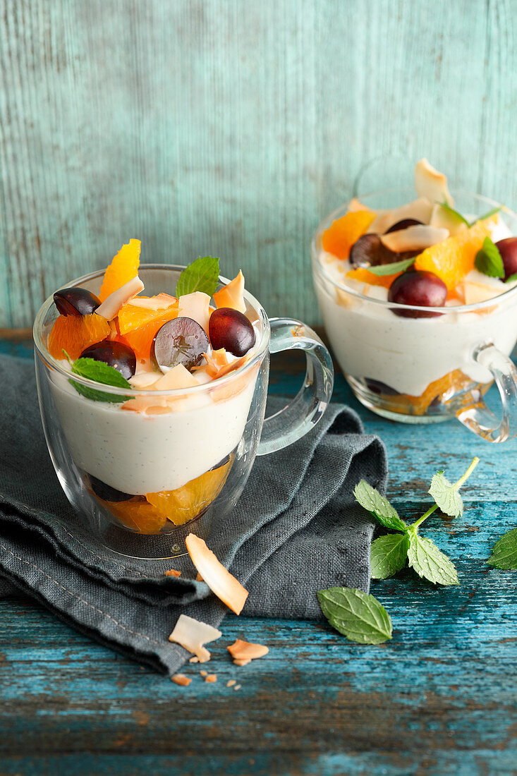 Coconut quark with blue grapes and oranges