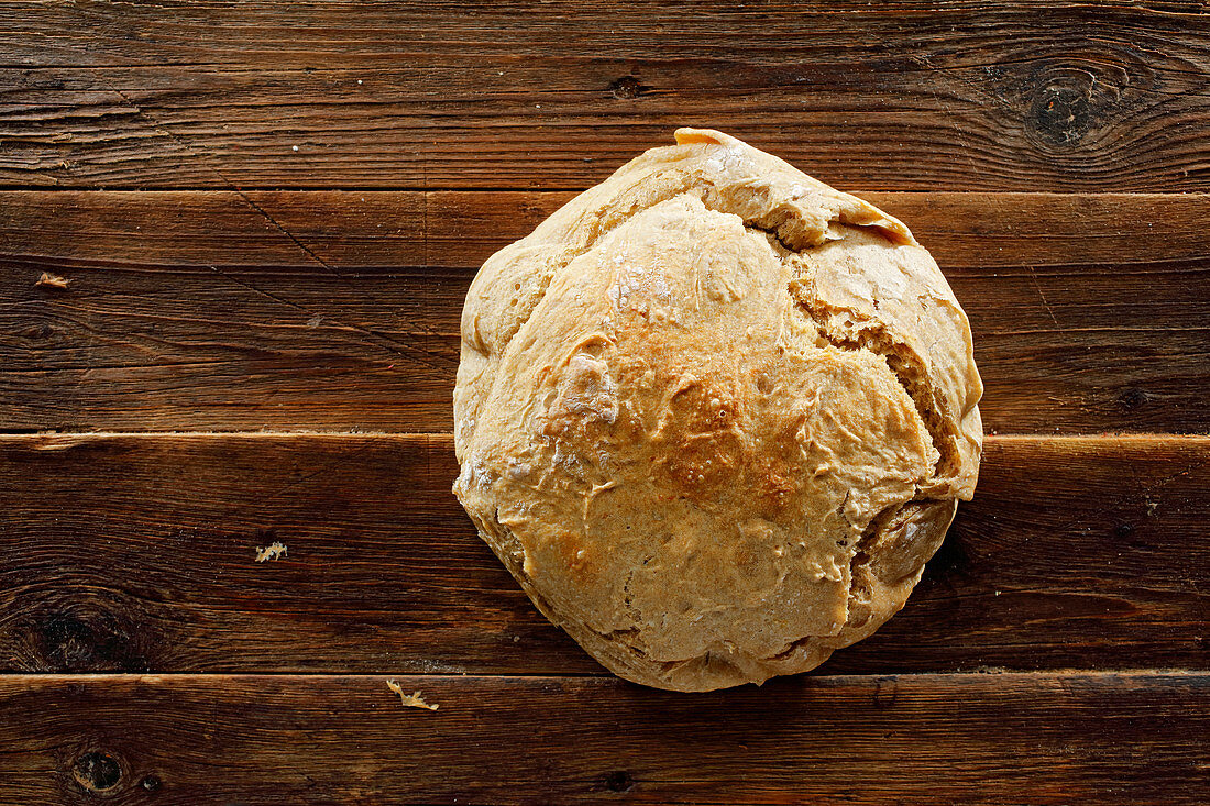 Potato bread on wooden background
