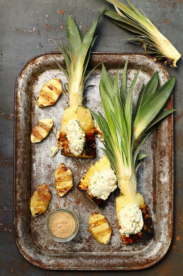 Grilled pineapples with coconut and basil cream