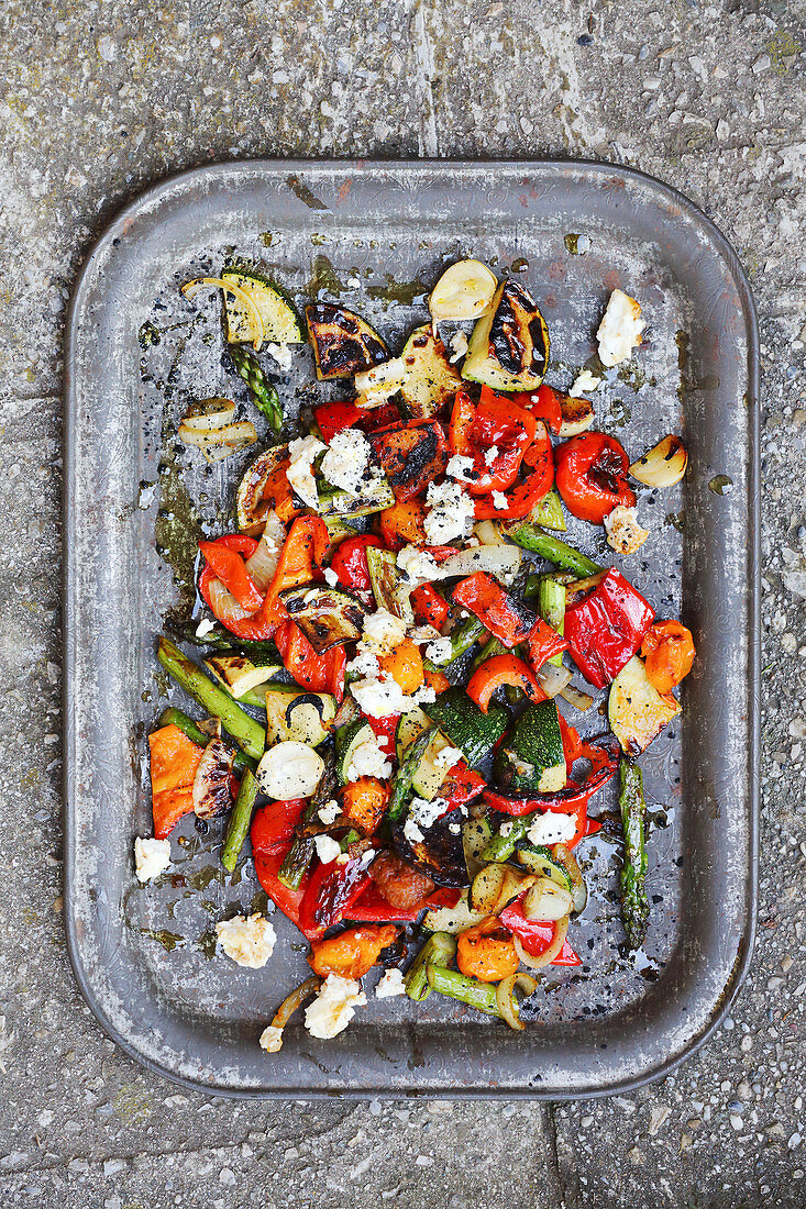 Grilled Mediterranean vegetables with feta cheese (seen from above)