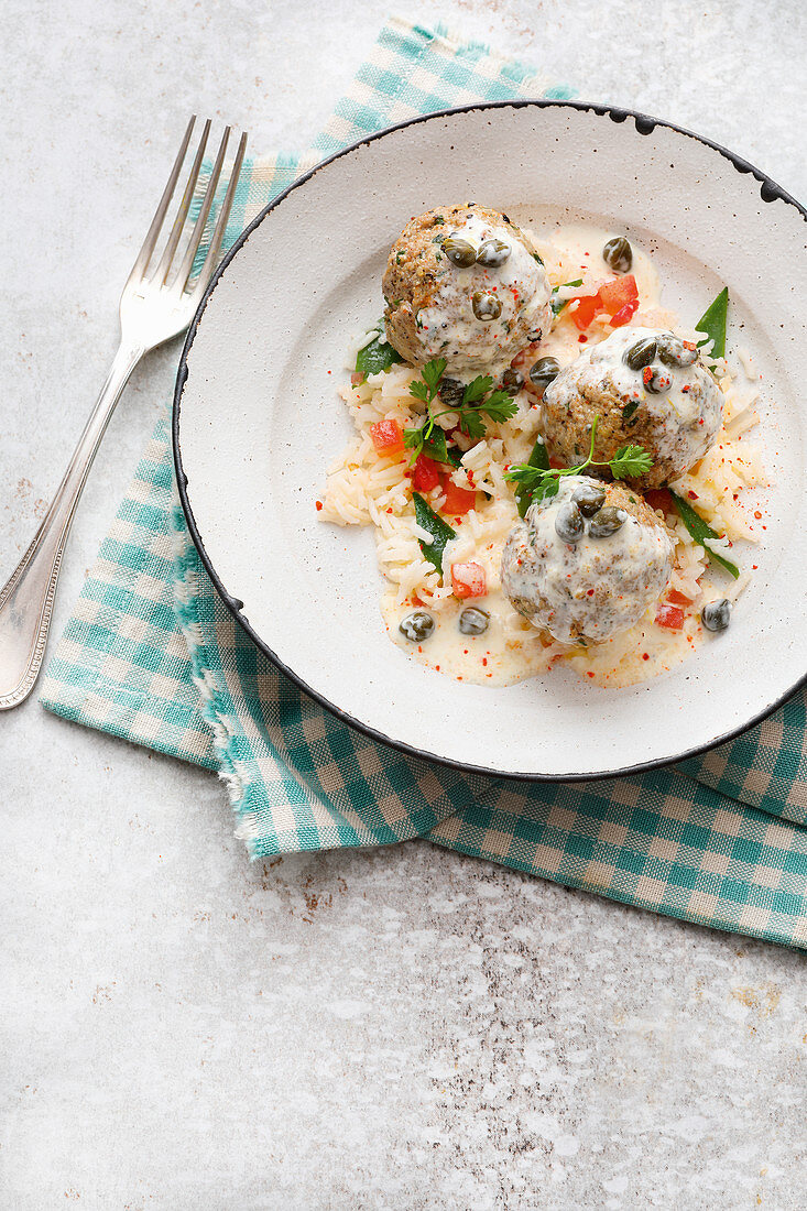 Königsberger Klopse (meatballs in white sauce with capers) on rice