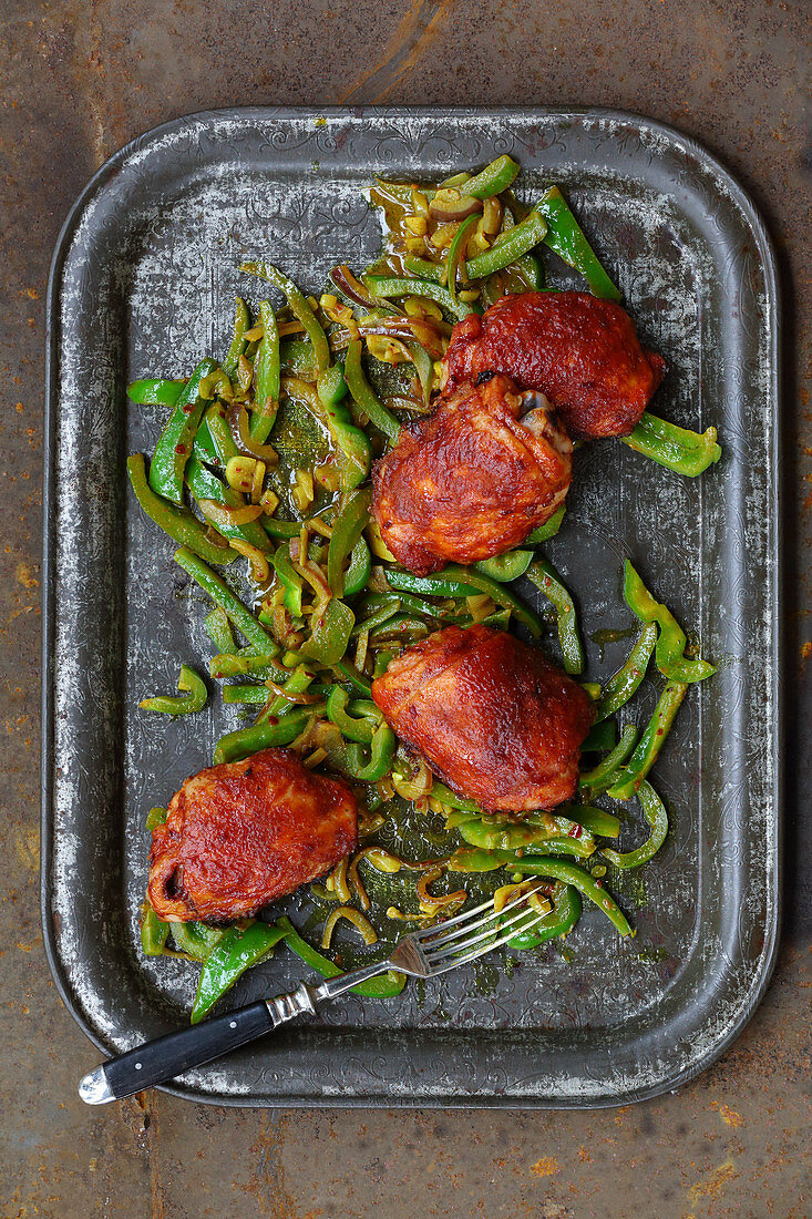 BBQ style glazed chicken drumsticks with Indian sliced peppers