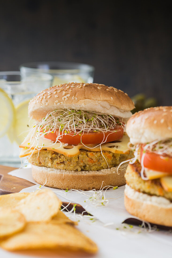 Vegan burger with quinoa, tomato and sprouts