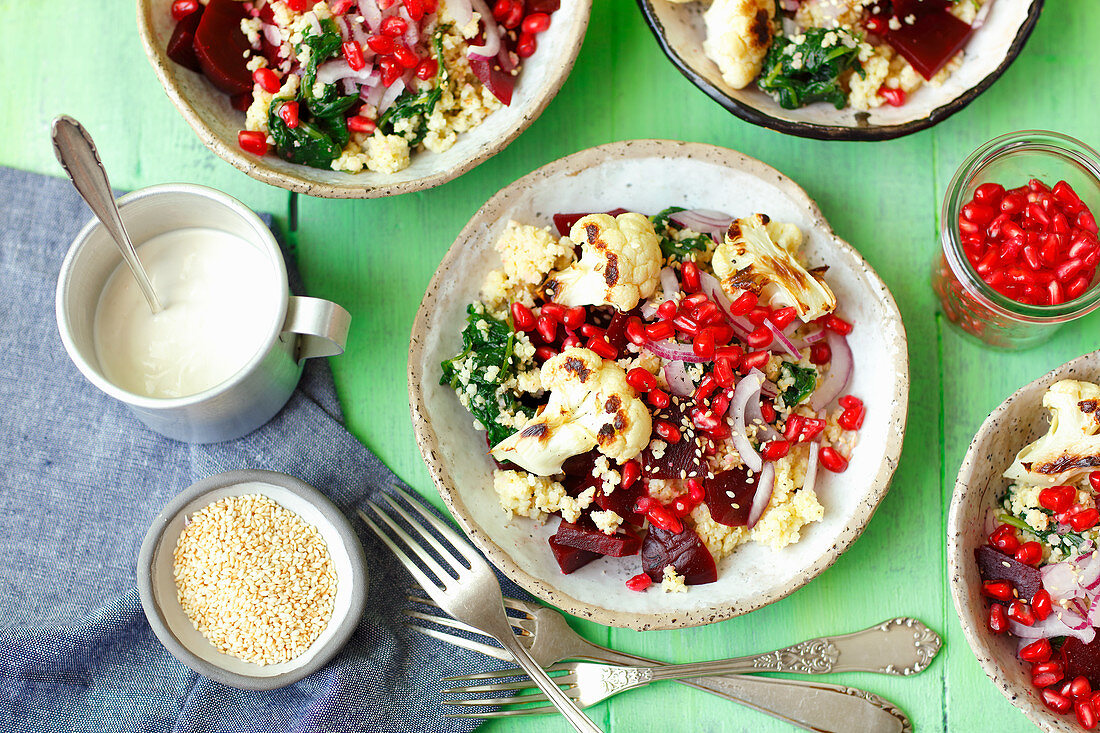 Couscous, beetroot and spinach salad with roasted cauliflower