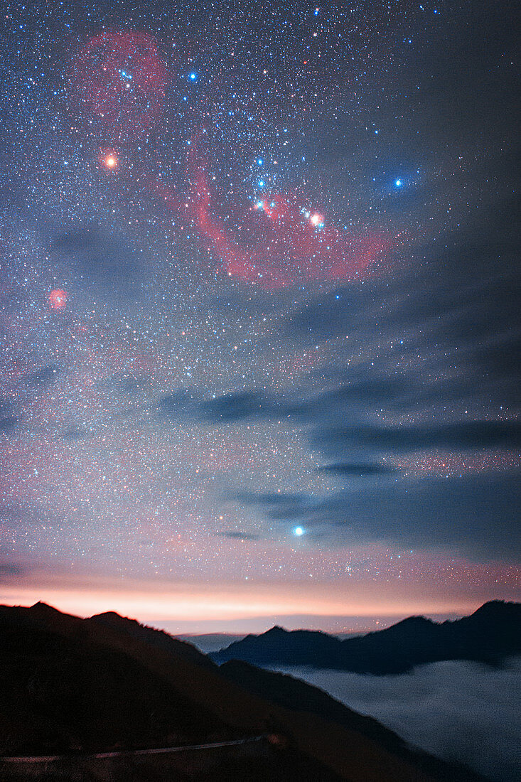 Orion in the night sky over mountains in China