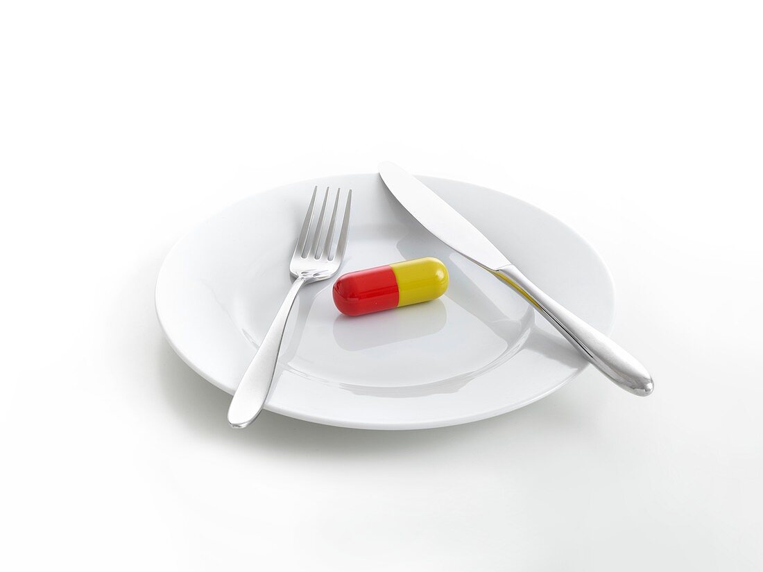 Capsule on dinner plate