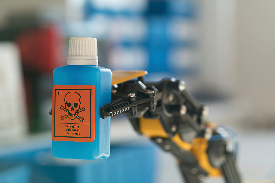 Robotic arm holding dangerous chemical