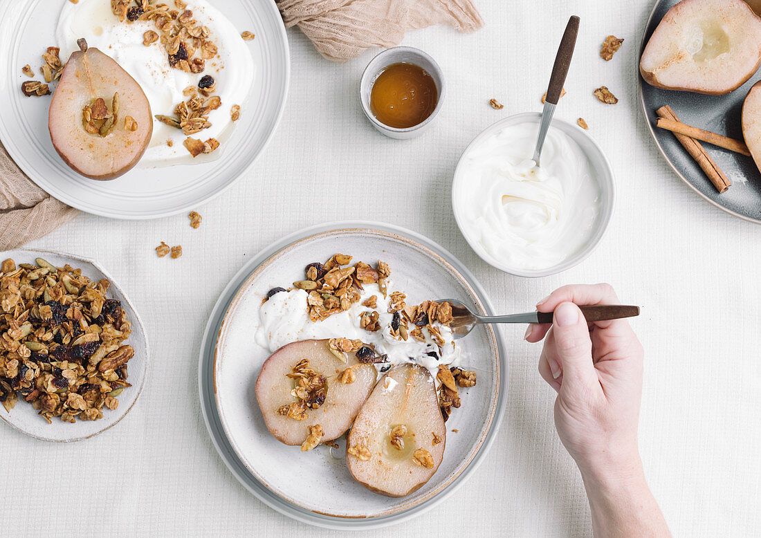 Poached Pears served with yogurt and maple granola