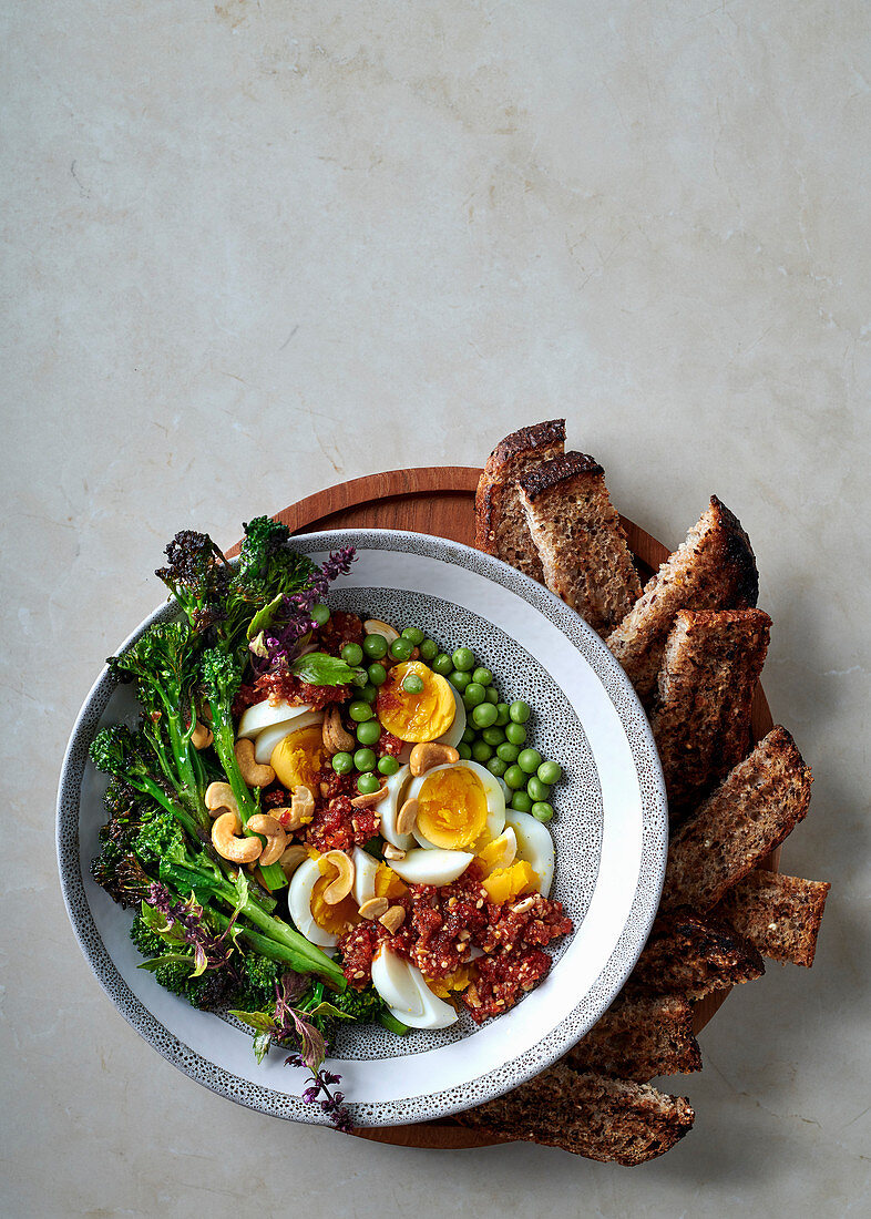 Egg salad with sun-dried tomato-and-cashew nut pesto and broccolini