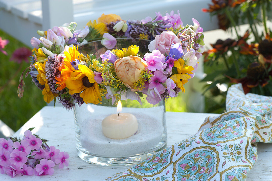 Lantern with wreath of flowers