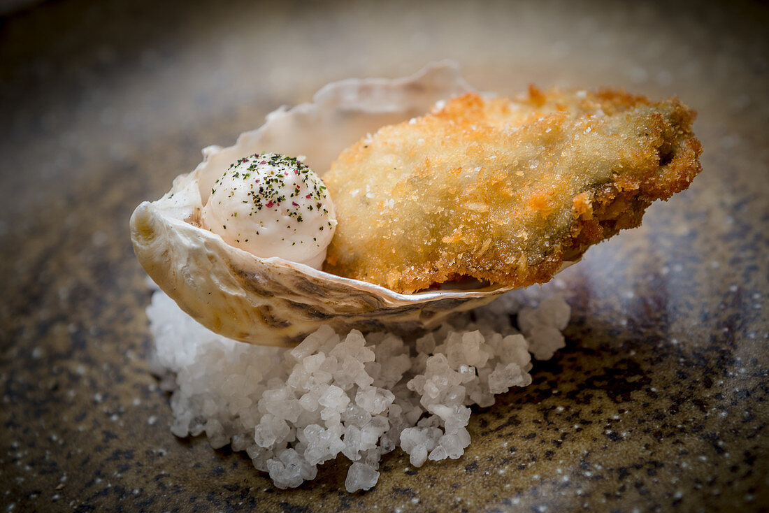 Breaded oyster in a shell