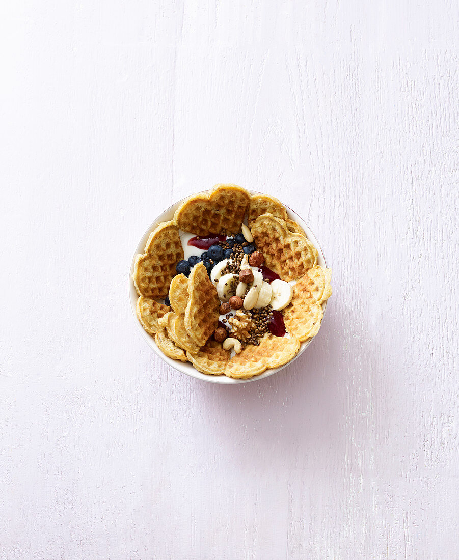 A waffle bowl with blueberries