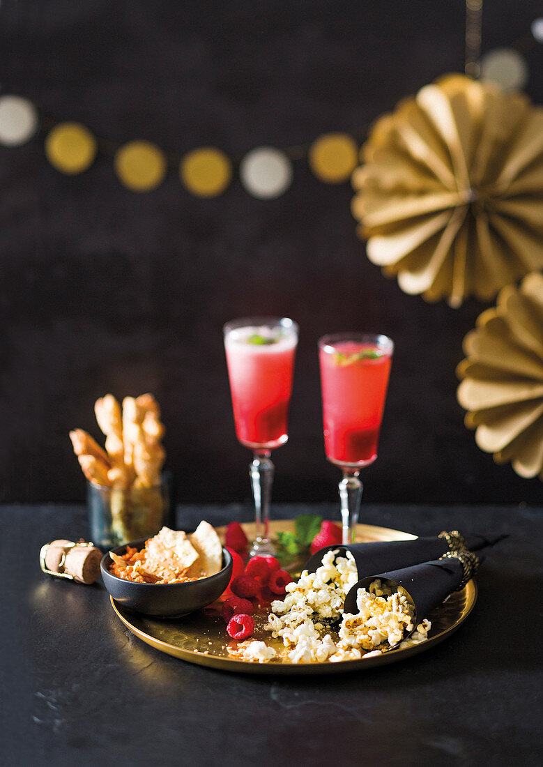 Raspberry bellini, popcorn cones and dukkha sticks